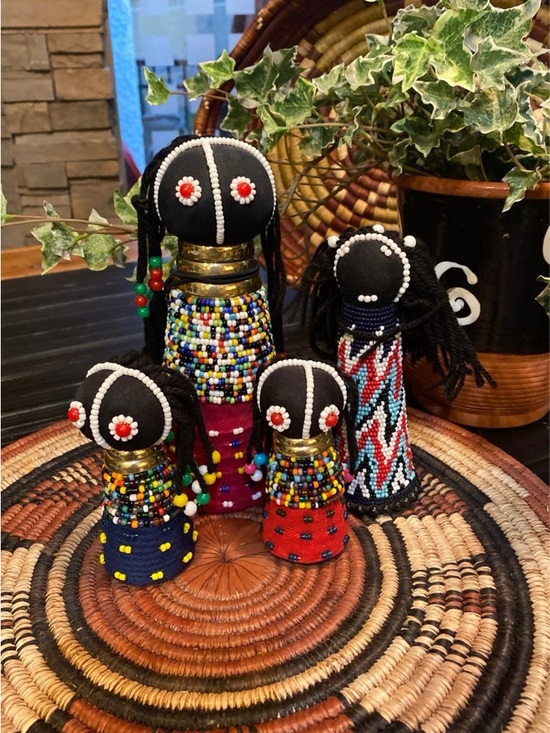 Left-Four Ndebele dolls [16] with distinguishing  4 African Zulu ceremonial dolls
